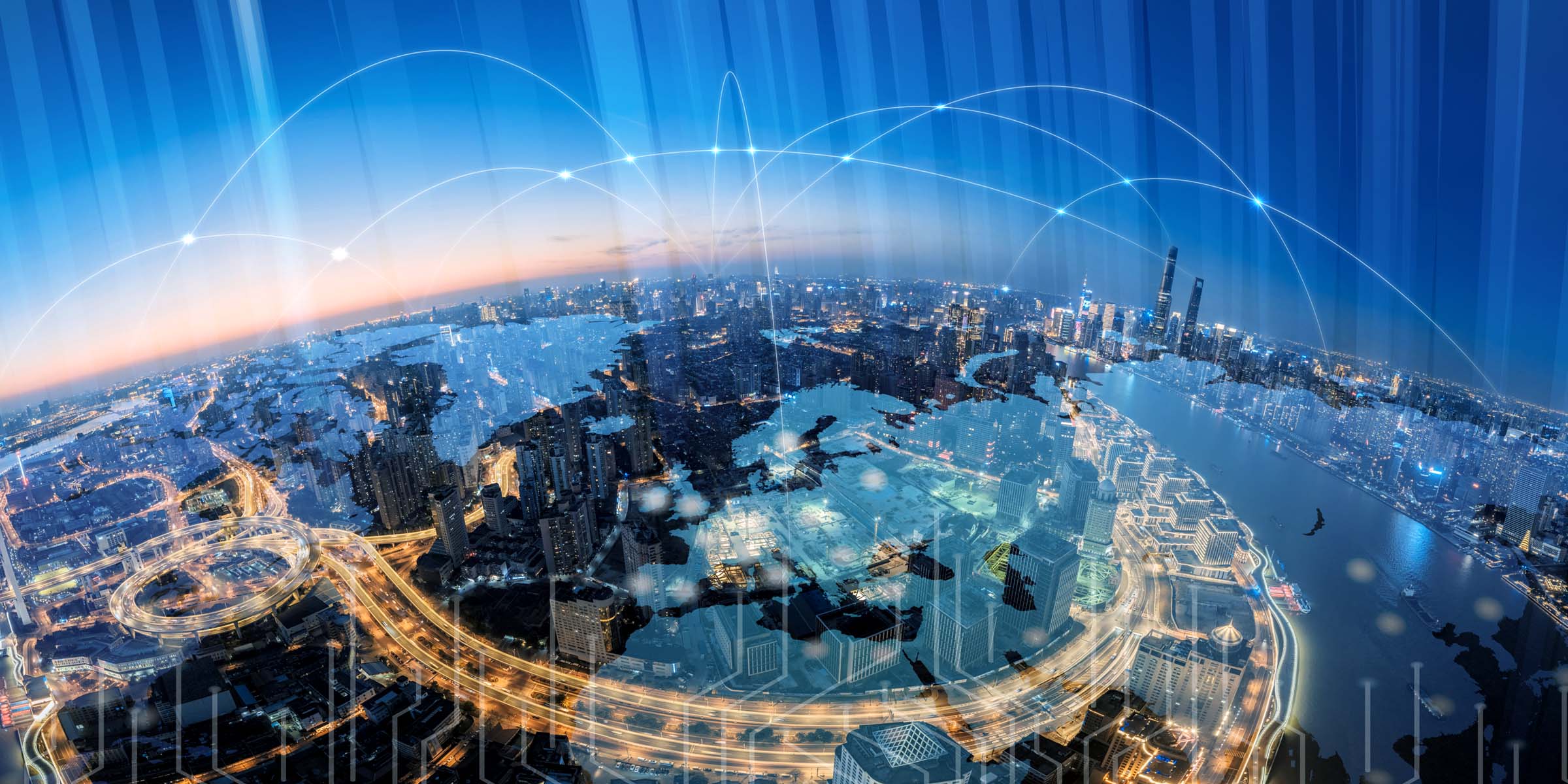 Ciudad vista desde arriba con muchas luces y conexiones entre edificios