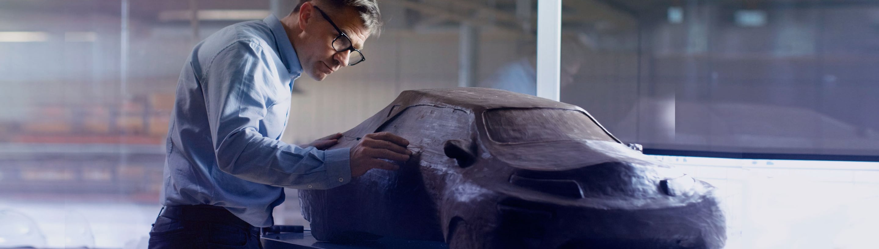 man-car-checking-concentrated-marquee